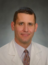 Dr. Adam Cohen